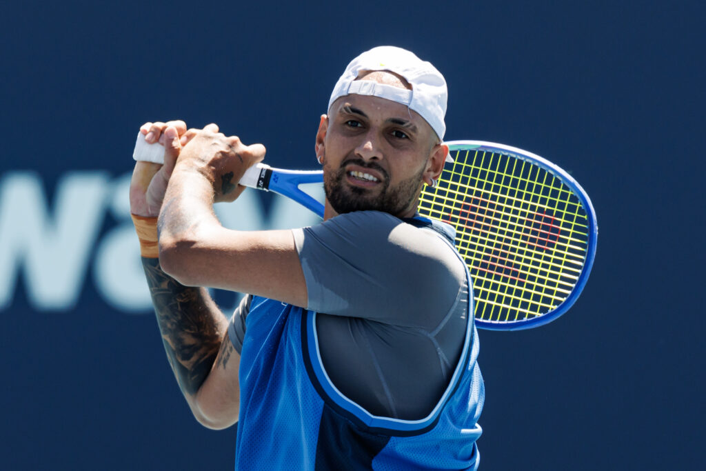 Nick Kyrgios of Australia hits a backhand against Karen Kachanov of Russia in the second round of the men's singles in the Miami Open at the Hard Rock Stadium on March 21, 2025 in Miami Gardens, Florida.