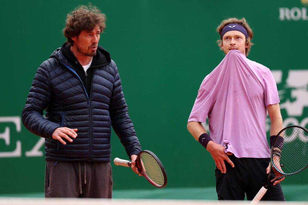 Marat Safin (L) is pictured with Andrey Rublev during round one of the Rolex Monte-Carlo Masters at Monte-Carlo Country Club on April 07, 2025 in Monte-Carlo, Monaco.
