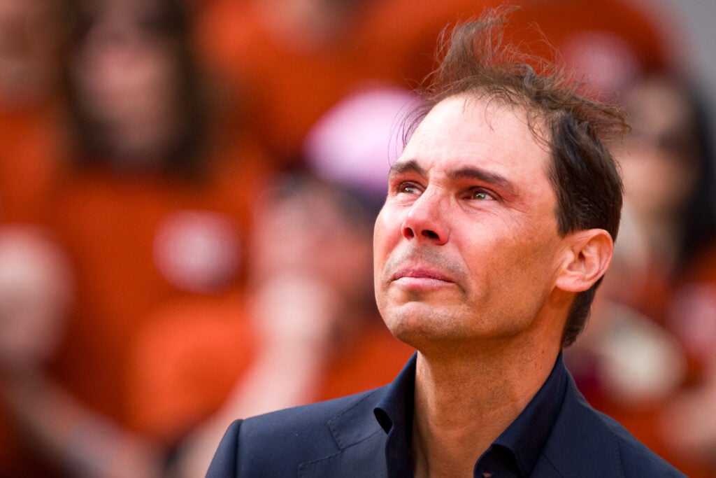 Rafael Nadal appears emotional on Court Philippe-Chatrier during a ceremony held in his honour on Day One of the 2025 French Open