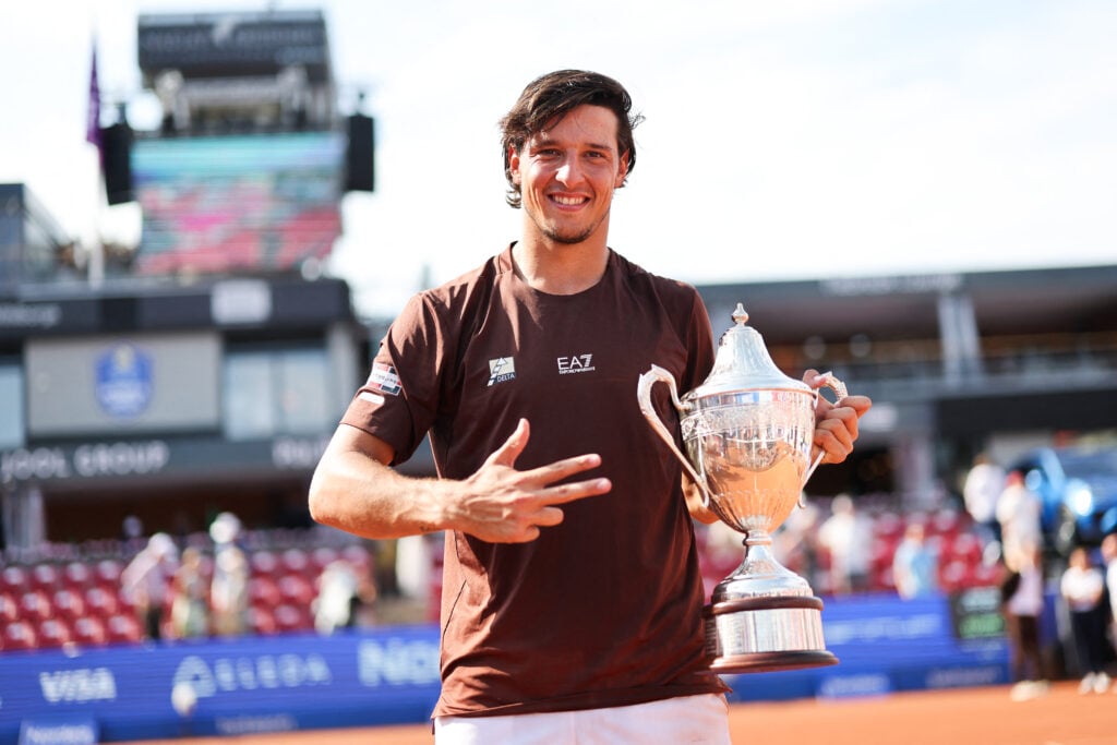 Italy's Luciano Darderi poses with the trophy after winning the men's singles final match against Netherlands' Jesper de Jong (not pictured) atthe ATP Nordea Open tennis tournament in Bastad, Sweden, on July 20, 2025.