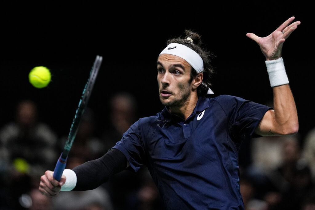 Lorenzo Musetti of Italy plays a backhand in the Men's Singles Second Round match against Lorenzo Sonego of Italy during day three of the Rolex Paris Masters 2025