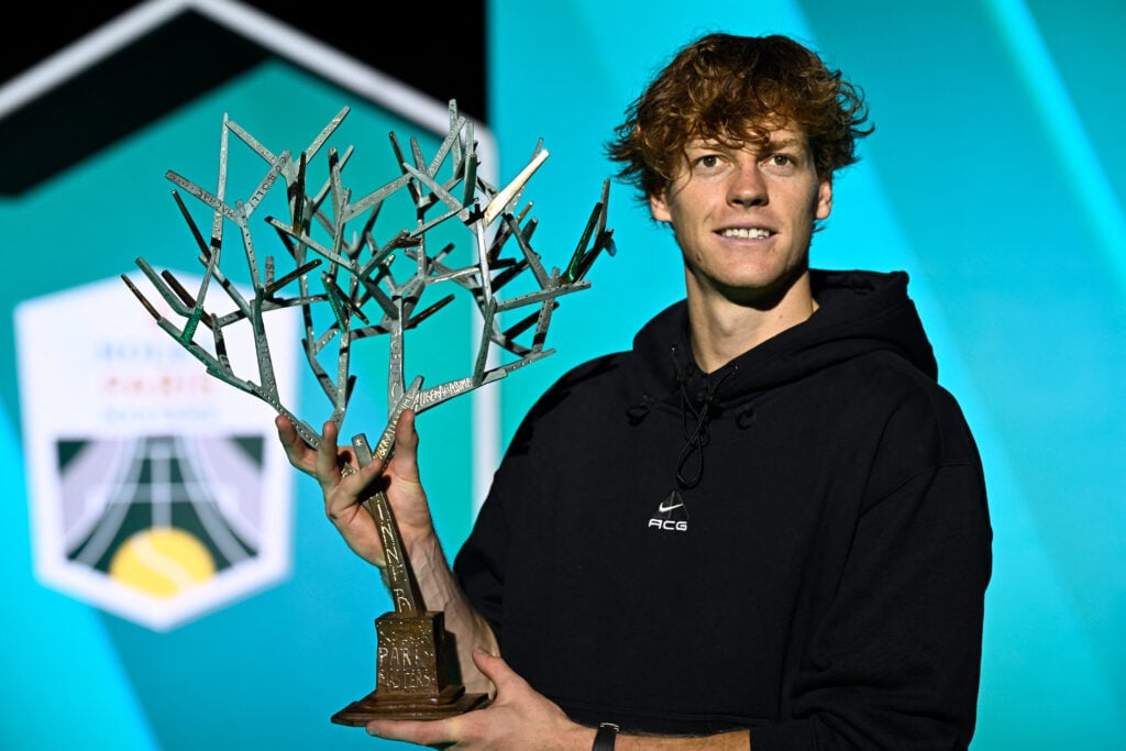 Italy's Jannik Sinner poses with the trophy after winning the men's singles final match of the Paris ATP Masters 1000 tennis tournament against Canada's Felix Auger-Aliassime at the Paris La Défense Arena