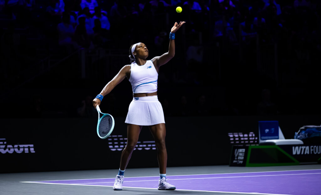 Coco Gauff of the United States serves against Jessica Pegula of the United States in the first round robin singles match on Day 2 of the WTA Finals Riyadh
