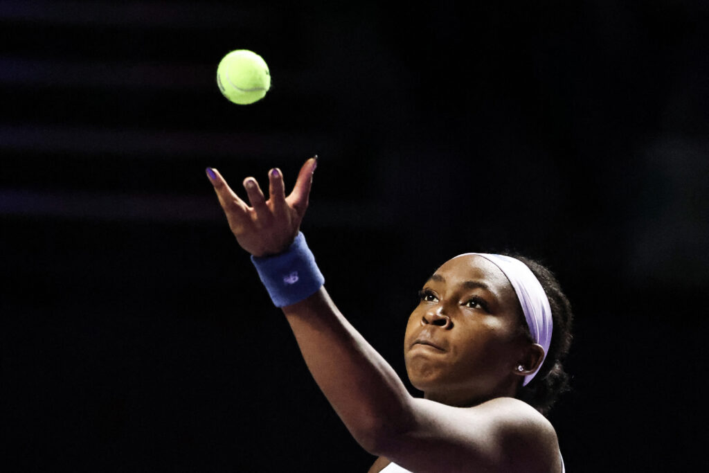 USA's Coco Gauff serves against Italy's Jasmine Paolini during their tennis match at the WTA Finals.