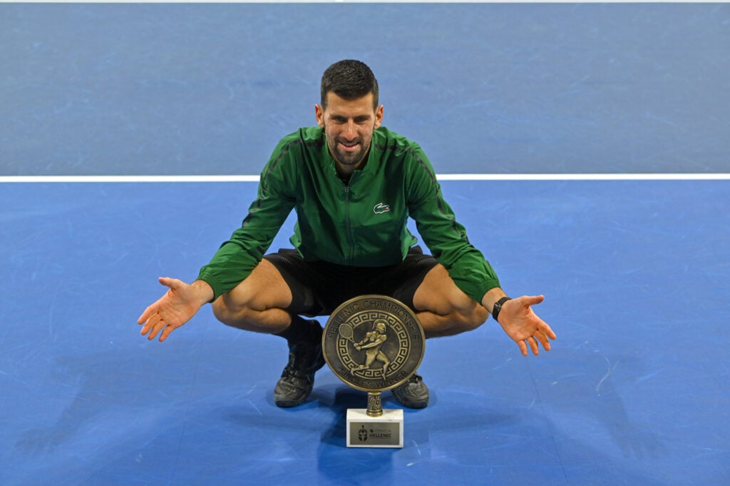 Novak Djokovic of Serbia holds the trophy after winning the final match against Lorenzo Musetti of Italy during Hellenic Championship ATP 250 final.