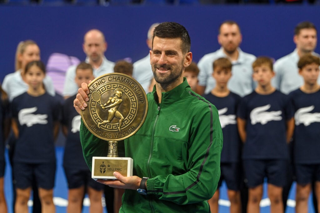 Novak Djokovic of Serbia holds the trophy after winning the final match against Lorenzo Musetti of Italy during Hellenic Championship ATP 250 final tennis match, at OAKA Olympic Athletic Center in Athens, Greece, on November 8, 2025 in Piraeus, Greece.
