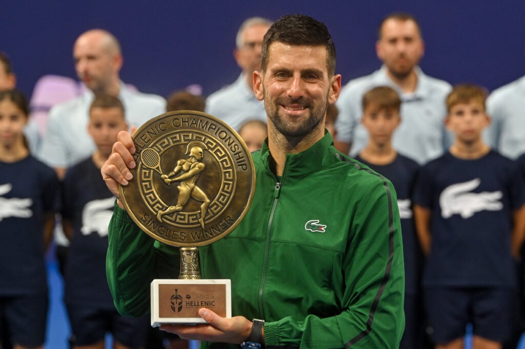 Novak Djokovic of Serbia holds the trophy after winning the final match against Lorenzo Musetti of Italy during Hellenic Championship ATP 250 final tennis match, at OAKA Olympic Athletic Center in Athens, Greece, on November 8, 2025.