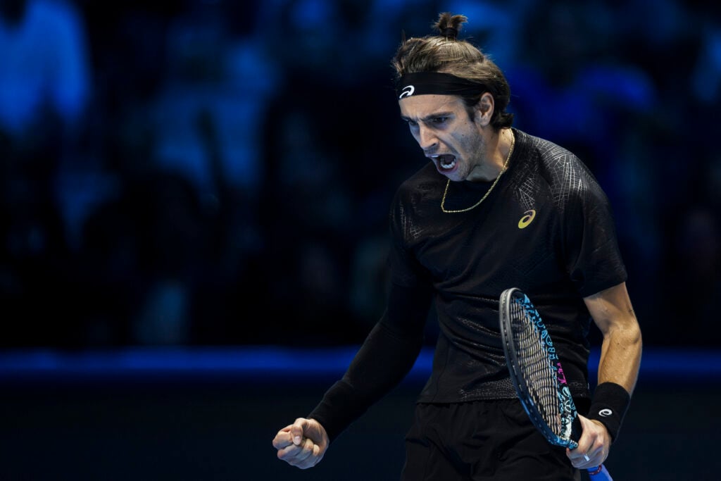 Lorenzo Musetti of Italy celebrates during his round robin singles match against Alex de Minaur of Australia during day three of the Nitto ATP Finals 2025.