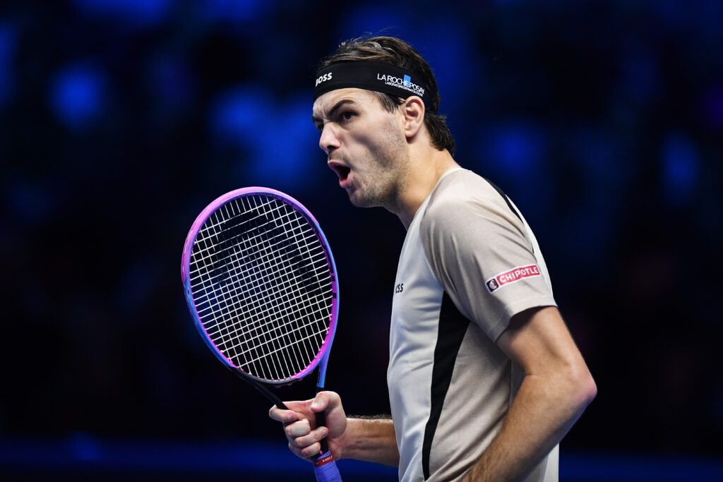 Taylor Fritz of United States celebrates winning the first set tie-break during the Men’s Singles Group Stage match against Carlos Alcaraz of Spain on day three of the Nitto ATP Finals 2025.