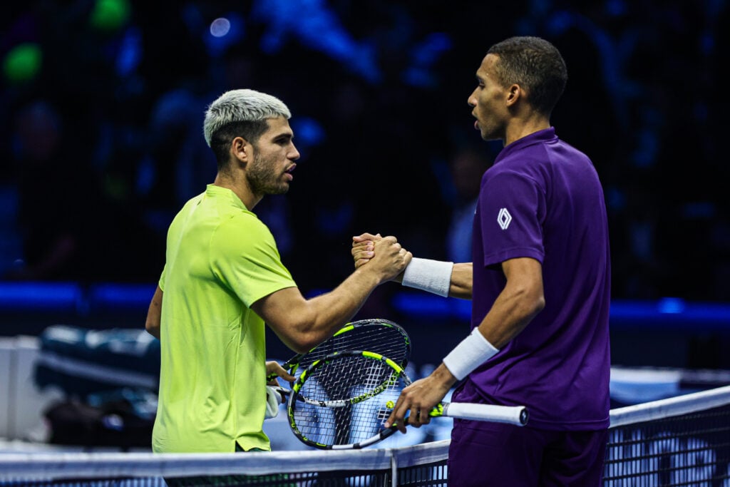 Felix Auger-Aliassime of Canada plays in the Men's Singles Round match against Carlos Alcaraz of Spain during day seven of the Nitto ATP Finals 2025 at Inalpi Arena in Turin, Italy, on November 15, 2025.