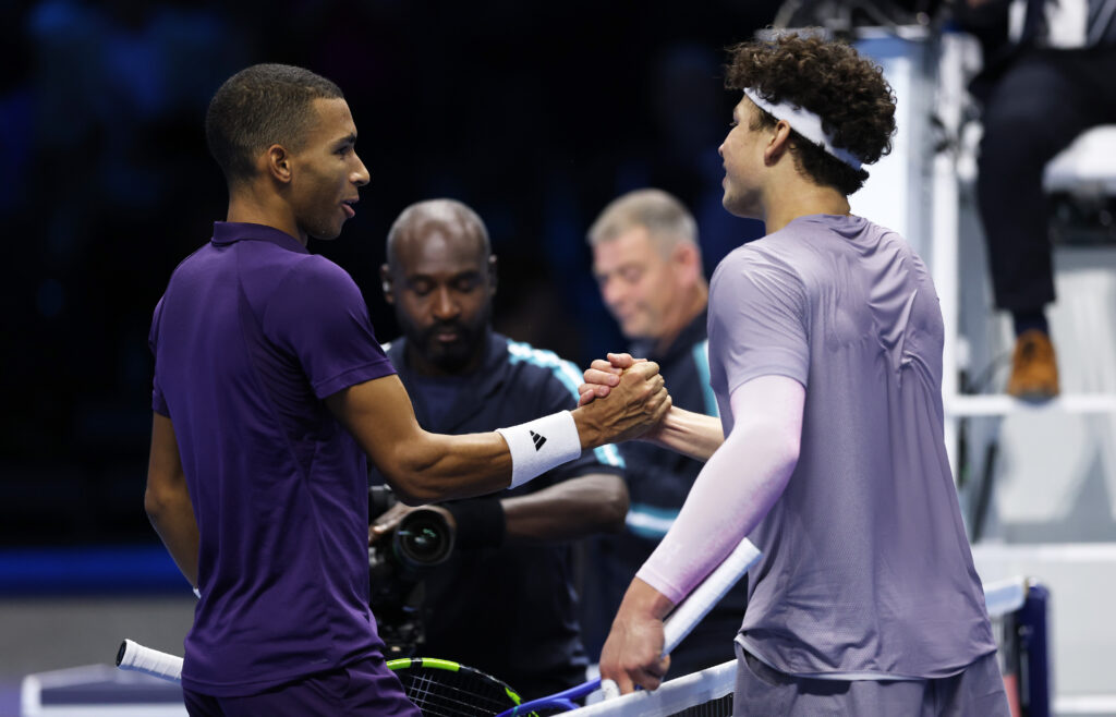 Felix Auger-Aliassime of Canada shakes hands at the net after his three set victory against Ben Shelton of United States during their Round Robin Singles match on day four of the Nitto ATP Finals 2025 at Inalpi Arena on November 12, 2025 in Turin, Italy.