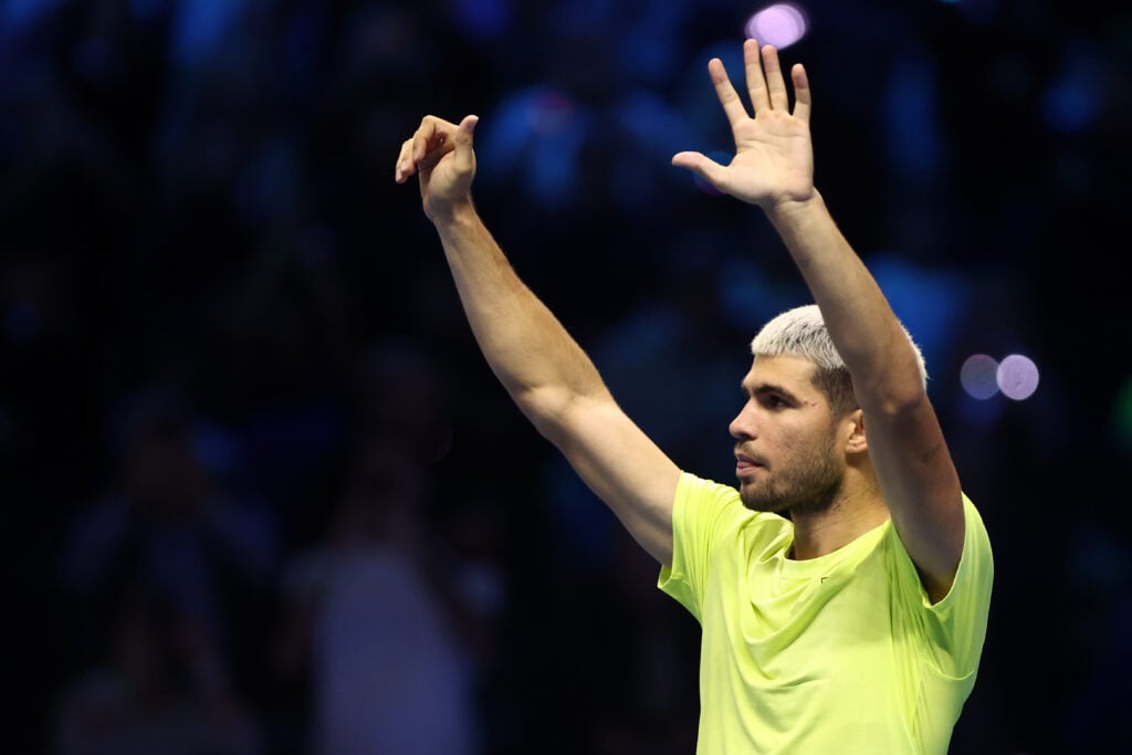 Carlos Alcaraz of Spain celebrate after winning the semi-final singles match between Carlos Alcaraz of Spain and Felix Auger-Aliassime of Canada during day seven of the Nitto ATP finals 2025 at Inalpi Arena on November 15, 2025.