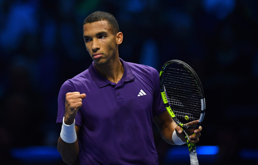 Felix Auger-Aliassime of Canada celebrates a point against Alexander Zverev of Germany in the Men’s Singles Group Stage match during day six of the Nitto ATP Finals 2025 at Inalpi Arena on November 14, 2025 in Turin, Italy.