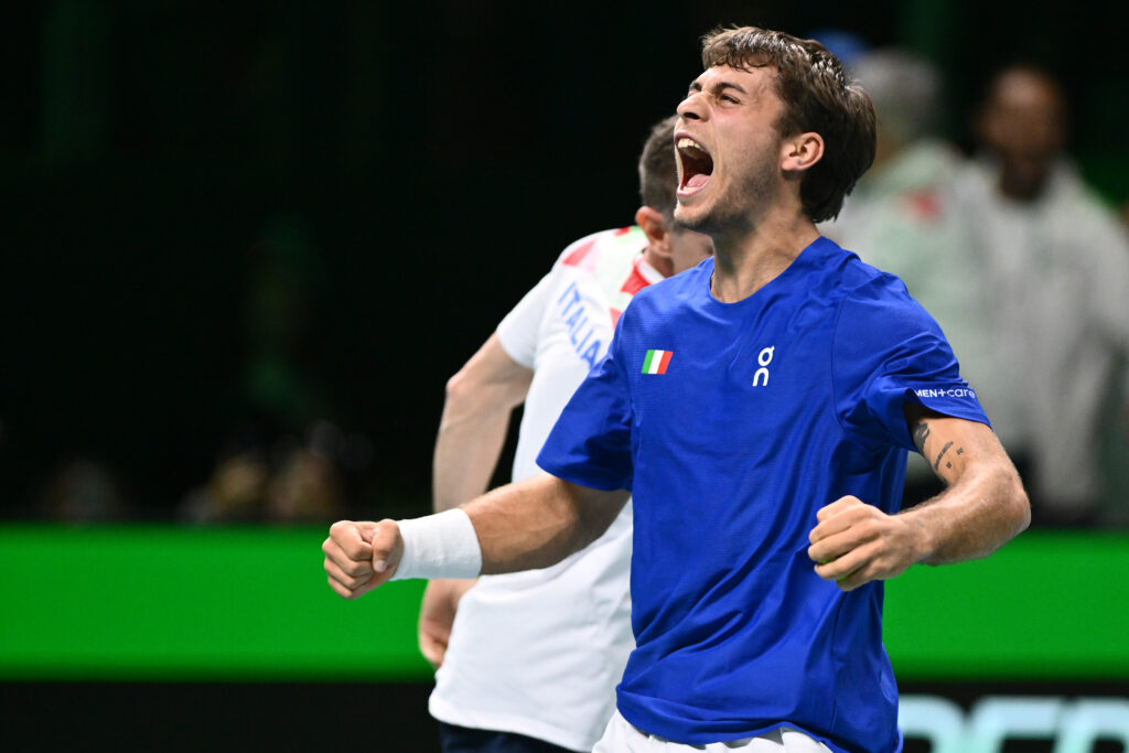 Flavio Cobolli of Italy celebrates the victory of the Davis Cup Semi-Final match between Flavio Cobolli of Italy and Zizou Bergs of Belgium at Supertennis Arena - Bolognafiere in Bologna, Italy, on November 21, 2025