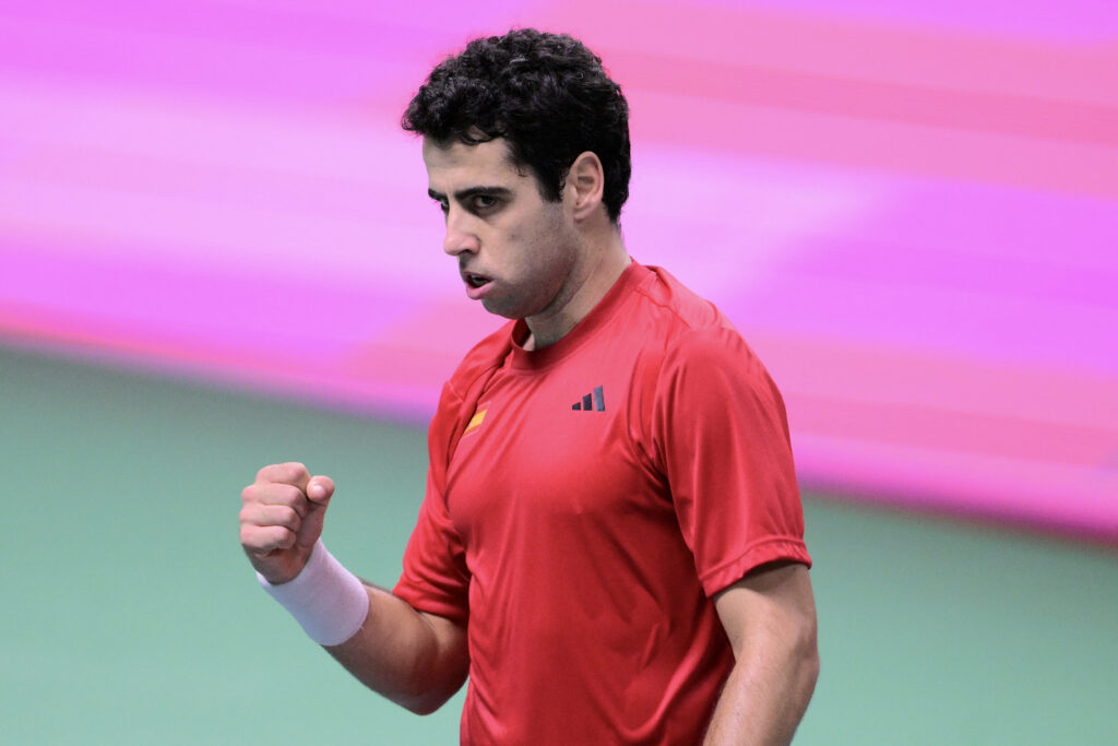 Spain's Jaume Munar Clar gestures as he plays against Italy's Flavio Cobolli during their 2025 Davis Cup men's single final tennis match at the Super Tennis Arena in Bologna, northen Italy, on November 23, 2025.