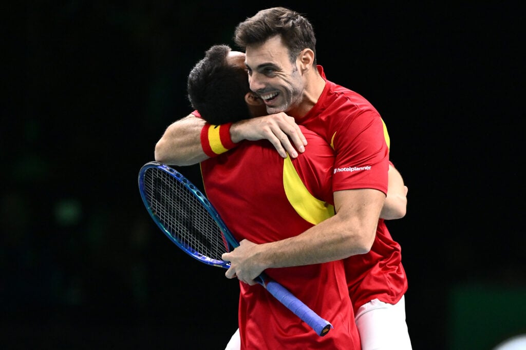 Pedro Martinez and Marcel Granollers of Spain celebrate match point against Jakub Mensik and Tomas Machac of Czechia following the Davis Cup Quarter-Final match between Spain and Czechia at BolognaFiere Exhibition Centre on November 20, 2025 in Bologna, Italy.