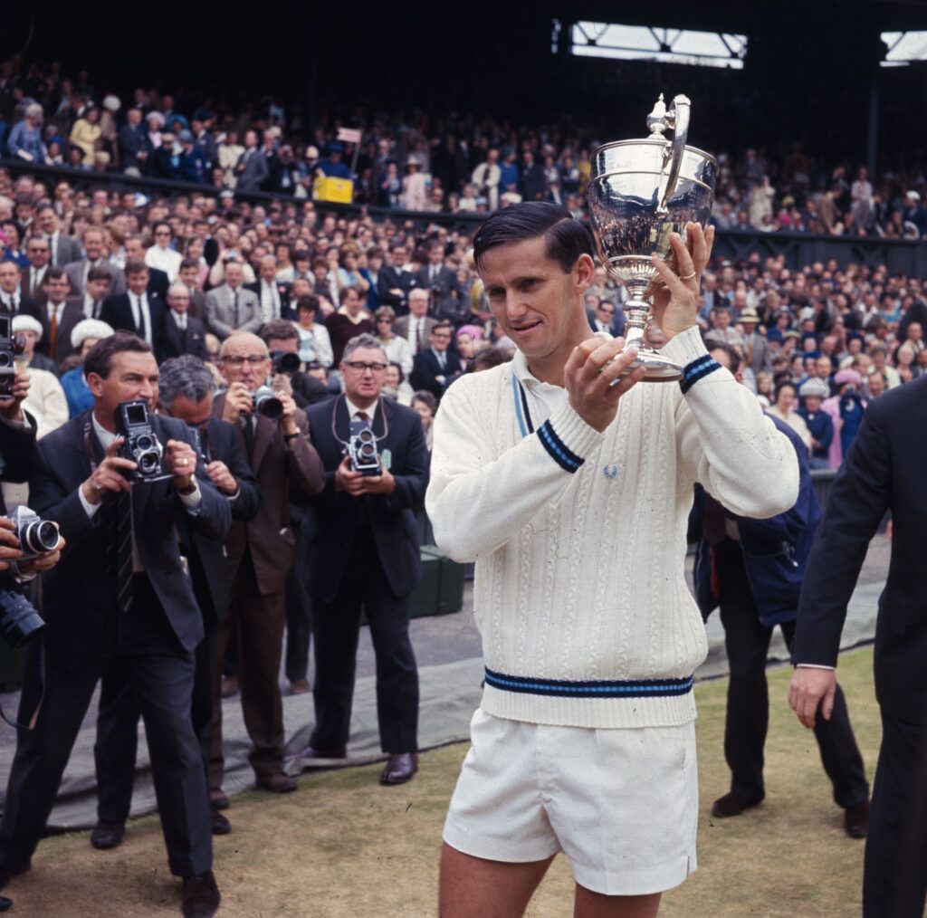 Australian tennis player Roy Emerson with the men's singles trophy after beating fellow Australian Fred Stolle in the final at the Wimbledon Lawn Tennis Championships.