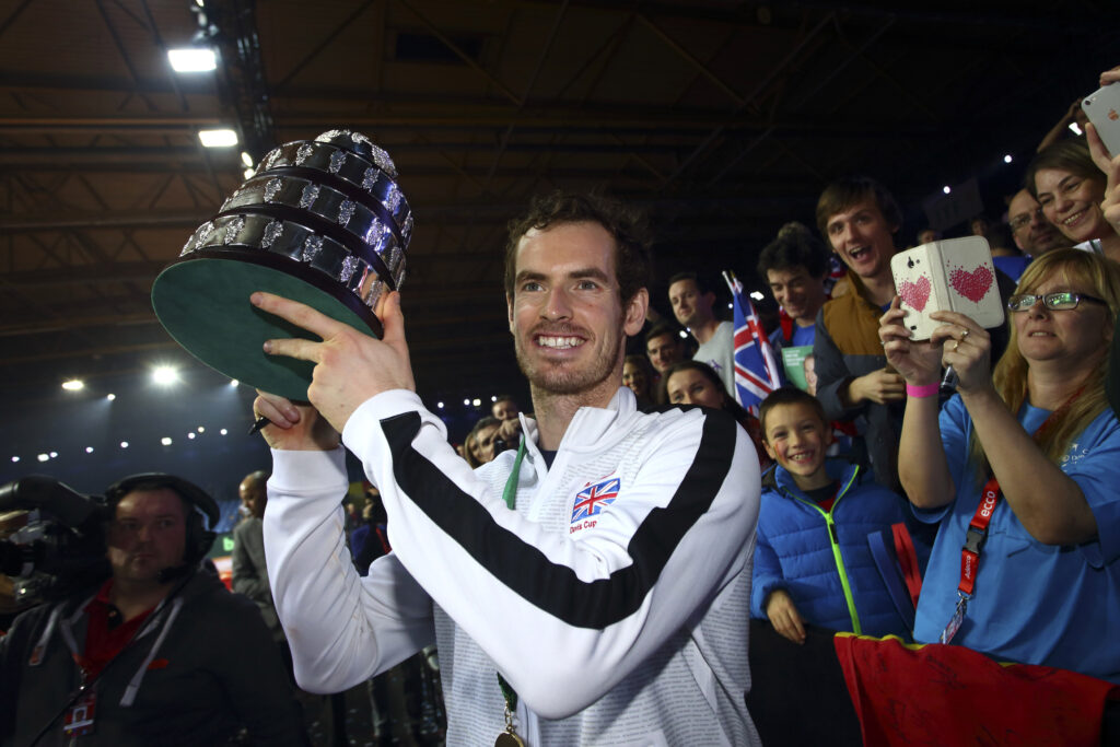 Andy Murray of Great Britain lifts the trophy following their victory during day three of the Davis Cup Final match between Belgium and Great Britain at Flanders Expo on November 29, 2015 in Ghent, Belgium.