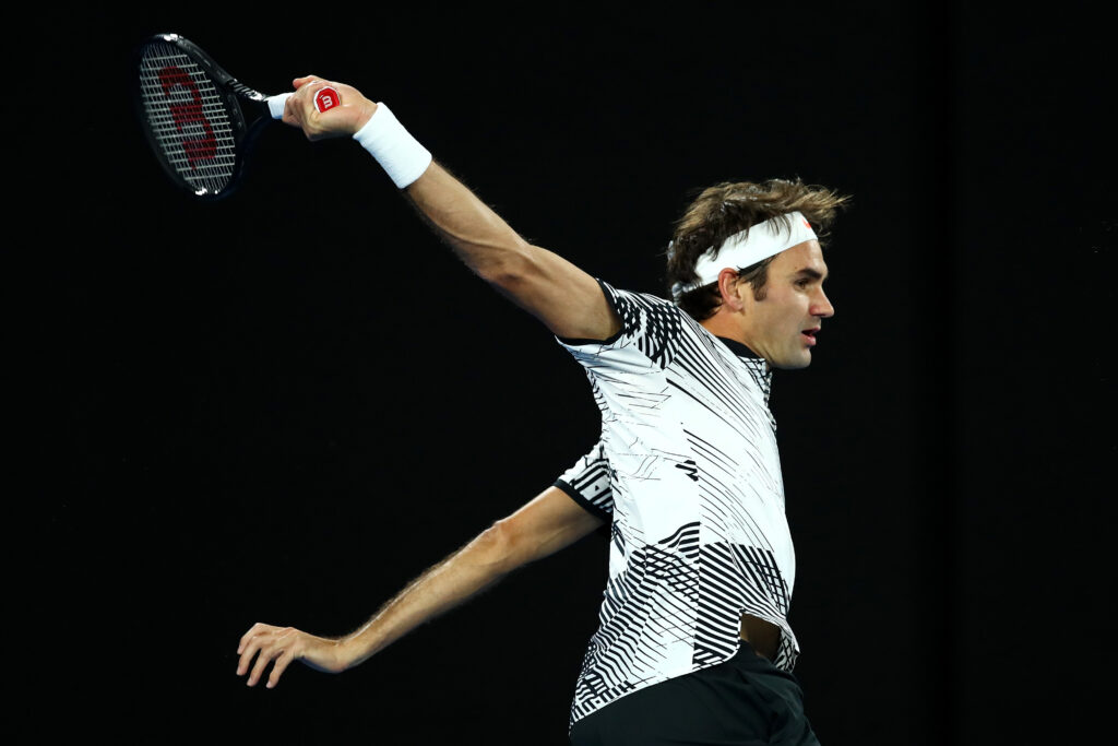 Roger Federer of Switzerland plays a backhand in his third round match against Thomas Berdych of the Czech Republic on day five of the 2017 Australian Open at Melbourne Park on January 20, 2017