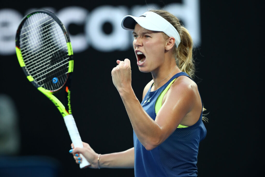 Caroline Wozniacki of Denmark celebrates winning a point in her women's singles final against Simona Halep of Romania on day 13 of the 2018 Australian Open at Melbourne Park on January 27, 2018 in Melbourne, Australia.