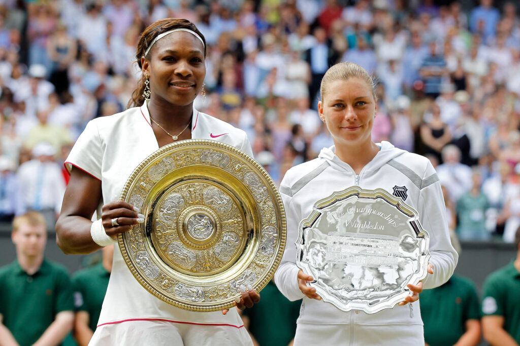 2010 Ladies Champion Serena Williams of USA (L) and runner up Vera Zvonareva of Russia pose after their Ladies Singles Final Match on Day Twelve of the Wimbledon Lawn Tennis Championships at the All England Lawn Tennis and Croquet Club on July 3, 2010 in London, England.