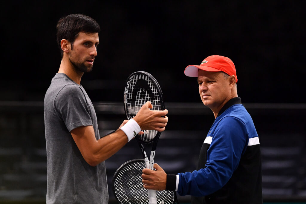 Novak Djokovic of
Serbia speaks with coach, Marian Vajda during practice ahead of the Rolex Paris Masters at AccorHotels Arena on October 27, 2018 in Paris, France.
