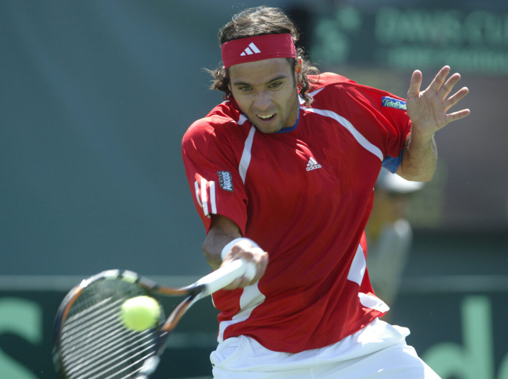 Chili's Fernando Gonzalez in action, during his 6-7, 0-6, 7-6, 6-4, 10-8 victory over the USA's James Blake during the match between the USA and Chili being played at the Mission Hills Country Club, Rancho Mirage, CA on April 7, 2006.