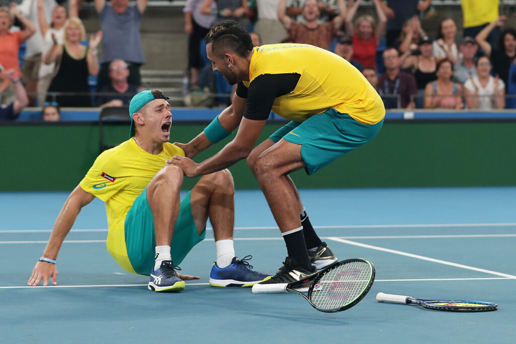 Alex de Minaur and Nick Kyrgios celebrate winning match point during their quarter final doubles match against Jamie Murray and Joe Salisbury of Great Britain during day seven of the 2020 ATP Cup at Ken Rosewall Arena on January 09, 2020 in Sydney, Australia.