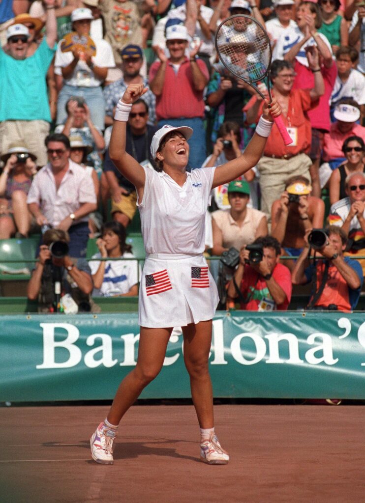 American Jennifer Capriati jubilates as she wins 7 August against German Steffi Graf at the tennis single women's final of the 1992 Olympic Games in Barcelona.
