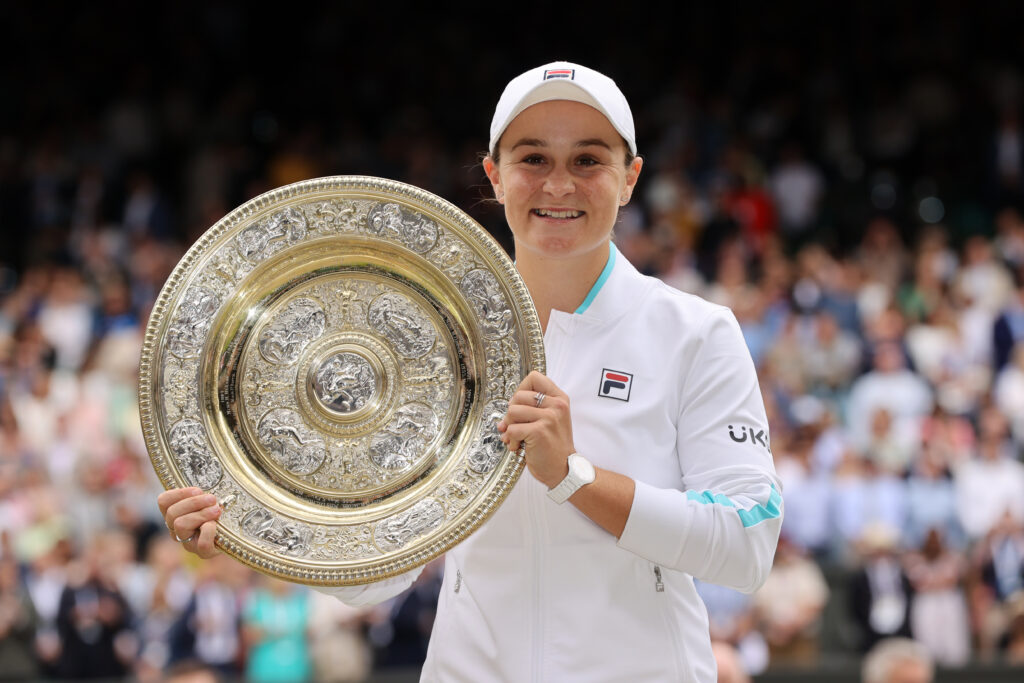 Ashleigh Barty of Australia celebrates with the Venus Rosewater Dish trophy after winning her Ladies' Singles Final match against Karolina Pliskova of The Czech Republic on Day Twelve of The Championships - Wimbledon 2021 at All England Lawn Tennis and Croquet Club on July 10, 2021 in London, England.