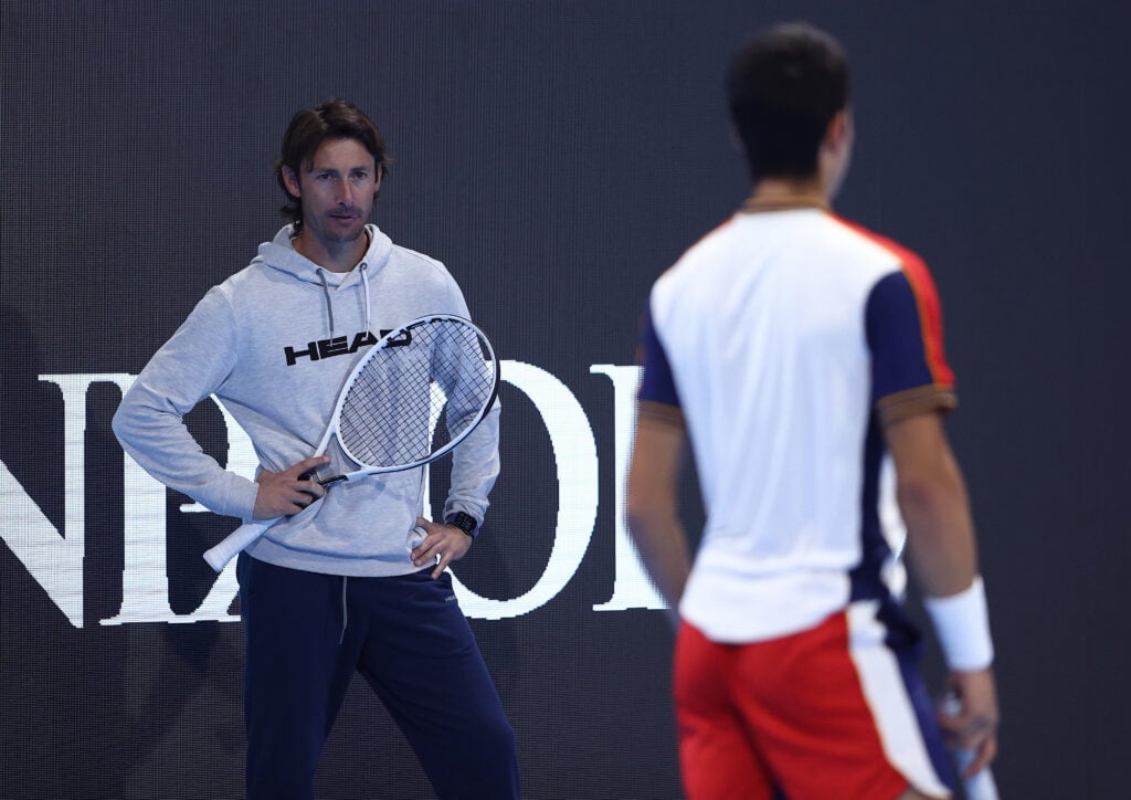 Carlos Alcaraz of Spain in a practice session with coach Juan Carlos Ferrero of Spain ahead of the Next Gen ATP Finals