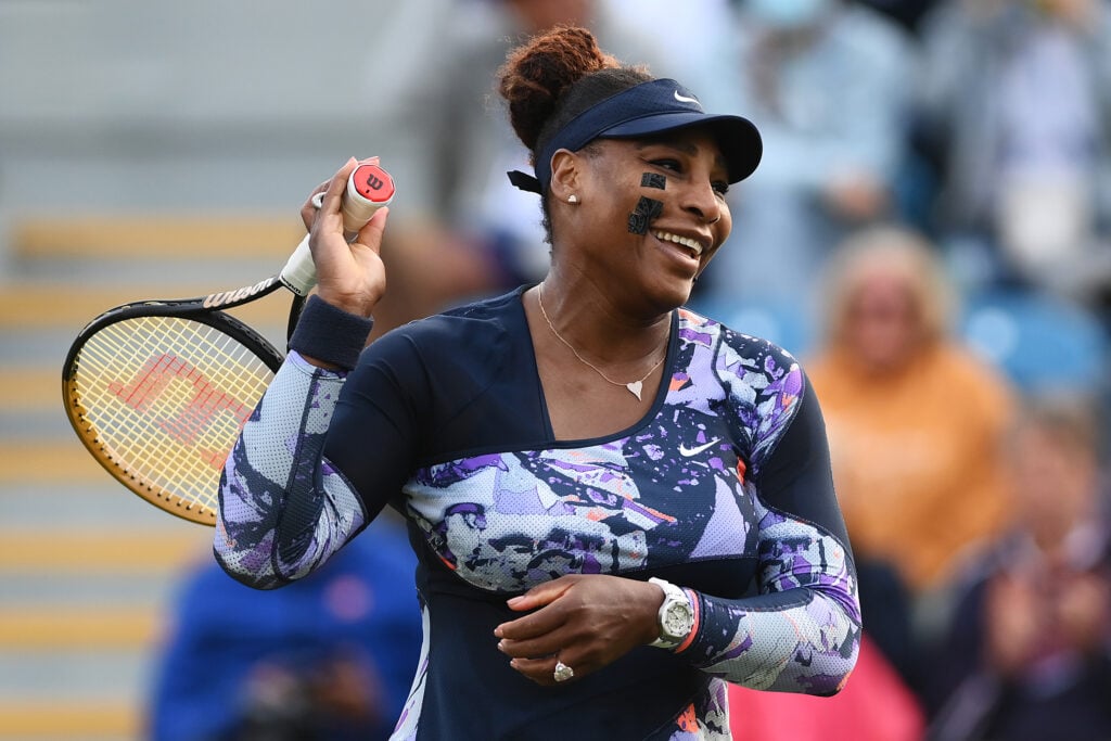 Serena Williams of United States of America laughs during their Women's Doubles Round One match against Marie Bouzkova of Czech Republic and Sara Sorribes Tormo of Spain on Day 4 of the Rothesay International at Devonshire Park on June 21, 2022 in Eastbourne, England.