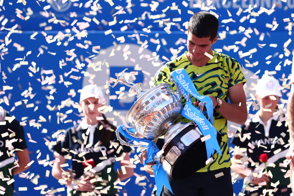 Carlos Alcaraz of Spain celebrates with the champion trophy after winning against Stefanos Tsitsipas of Greece during the Final match of the Barcelona Open Banc Sabadell 2023 (Conde Godo) at Real Club De Tenis Barcelona on April 23, 2023 in Barcelona, Spain