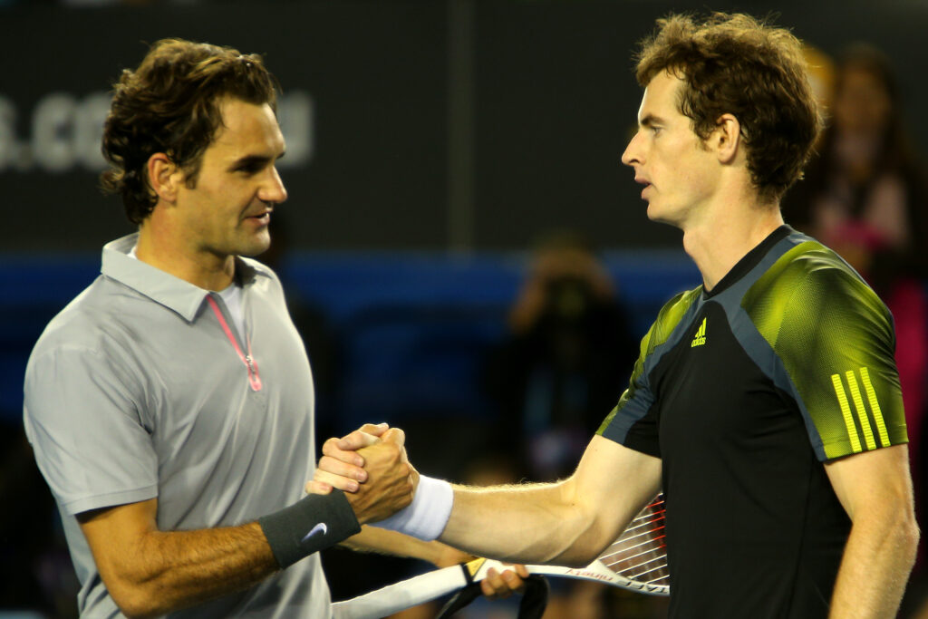Andy Murray of Great Britain shakes hands with Roger Federer of Switzerland after Murray won their semifinal match during day twelve of the 2013 Australian Open at Melbourne Park on January 25, 2013 in Melbourne, Australia.