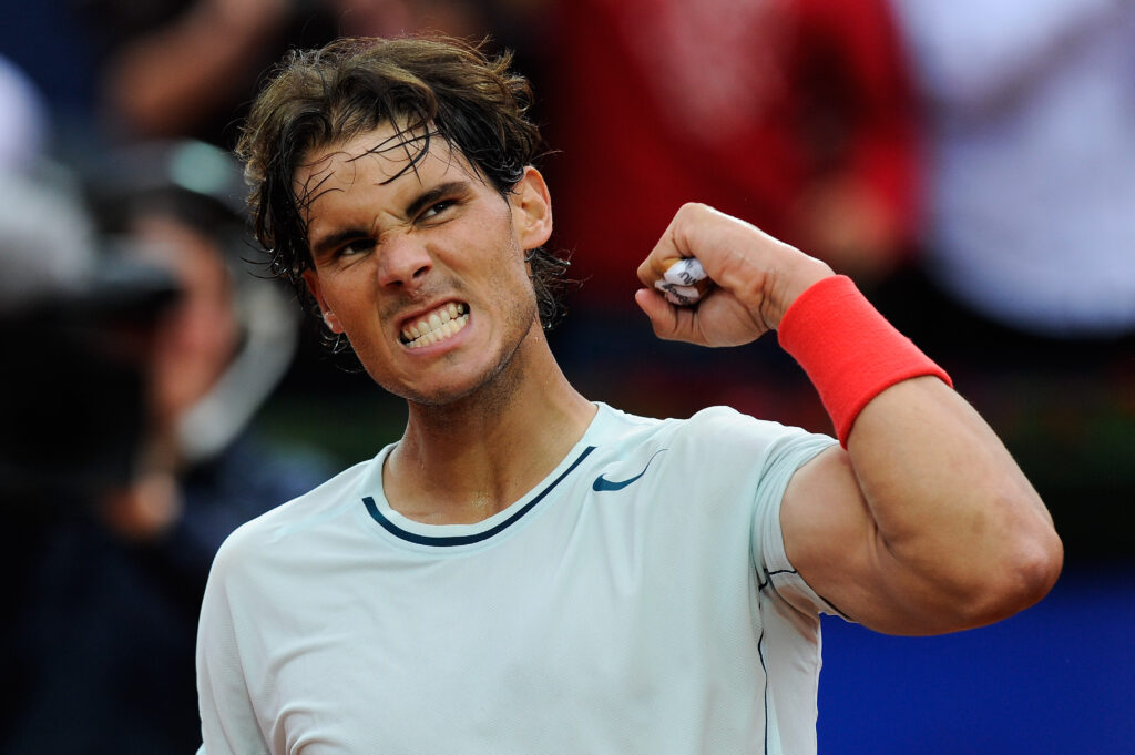 Rafael Nadal of Spain celebrates winning his quarter-final match against Albert Ramos of Spain during day five of the 2013 Barcelona Open Banc Sabadell on April 26, 2013 in Barcelona, Spain. Rafael Nadal won 6-3, 6-0.