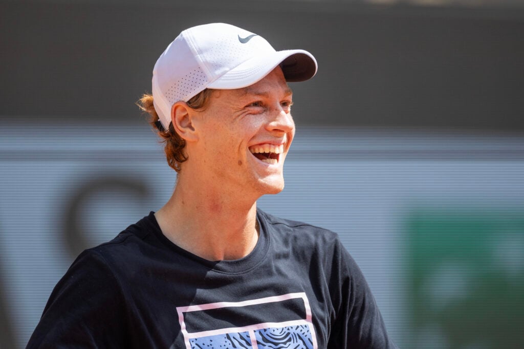 Jannik Sinner of Italy during a light hearted moment while training with Hubert Hurkacz of Poland on Court Philippe-Chatrier in preparation for the 2024 French Open Tennis Tournament