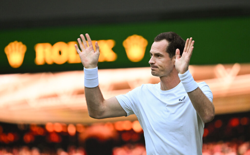 Andy Murray of Great Britain waves to the crowd on Centre Court following the Gentlemen’s Doubles first round match with Jamie Murray against Rinky Hijikata and John Peers of Australia during day four of The Championships Wimbledon 2024 at All England Lawn Tennis and Croquet Club on July 04, 2024 in London, England.