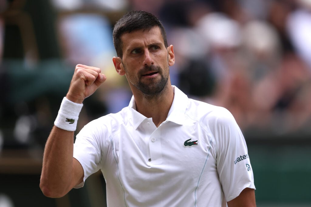 Novak Djokovic of Serbia celebrates as he plays against Lorenzo Musetti of Italy in the Gentlemen's Singles Semi-Final match during day twelve of The Championships Wimbledon 2024 at All England Lawn Tennis and Croquet Club on July 12, 2024 in London, England.