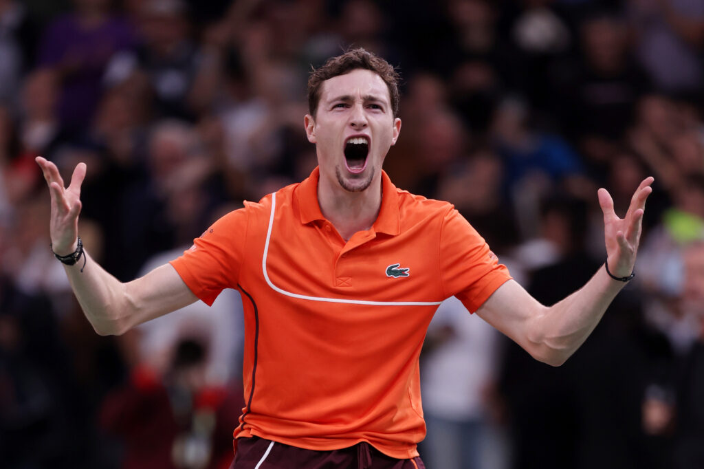 Ugo Humbert of France celebrates after winning match point against Carlos Alcaraz of Spain in their Men's Singles Third Round match on day four of the Rolex Paris Masters 2024 on October 31, 2024 in Paris, France.