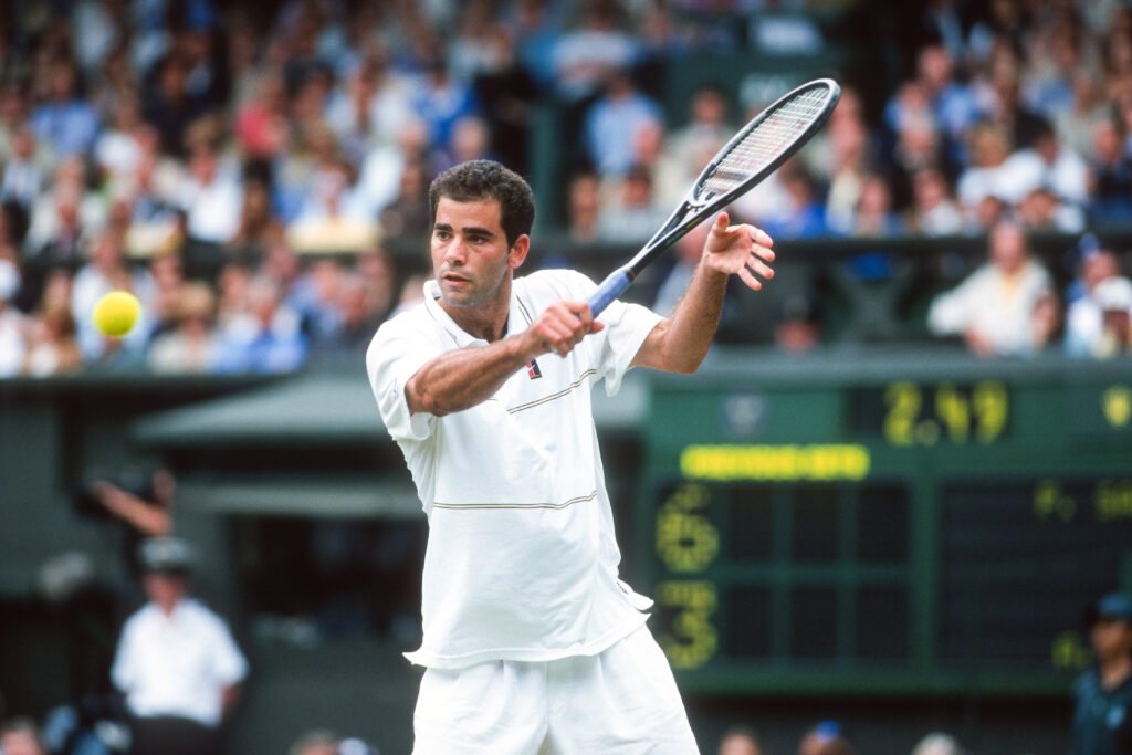 Pete Sampras of the USA in action against Andre Agassi of the of USA in the Men's Singles Final at The Wimbledon Lawn Tennis Championship at the All England Lawn and Tennis Club at Wimbledon on July 4th, 1999 in London, England.