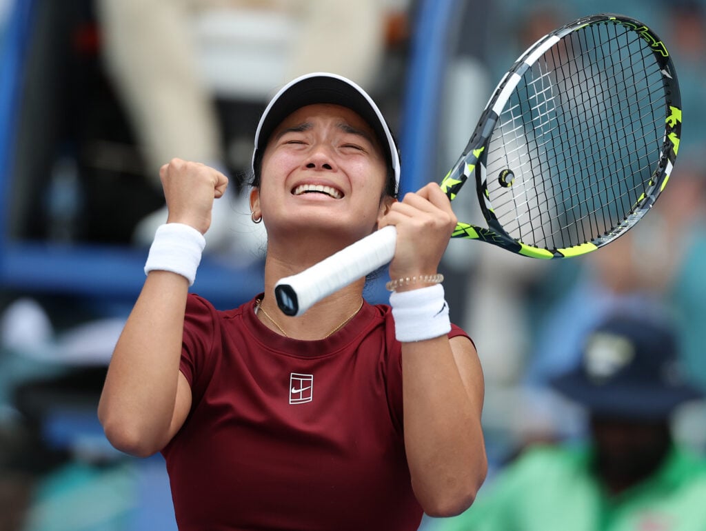 Alexandra Eala of the Philippines reacts at match point after defeating Iga Swiatek of Poland on Day 9 of the Miami Open at Hard Rock Stadium on March 26, 2025 in Miami Gardens, Florida.