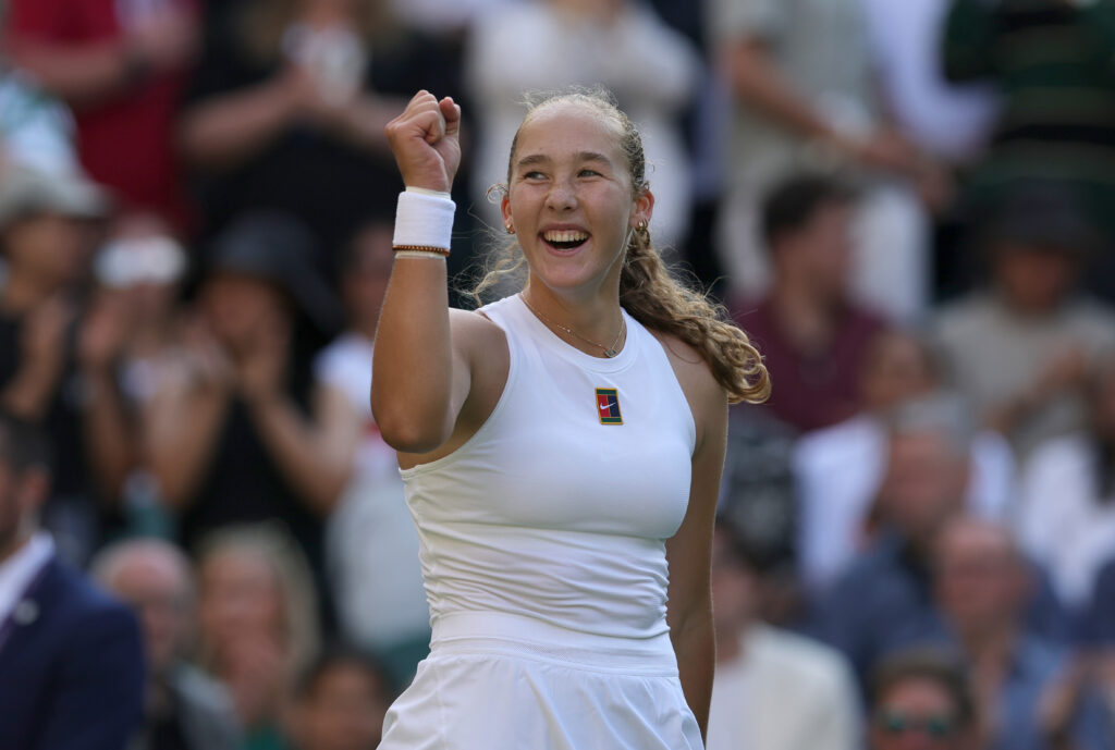 Mirra Andreeva celebrates winning match point against Emma Navarro of United States during the Ladies' Singles fourth round match on day eight of The Championships Wimbledon 2025 at All England Lawn Tennis and Croquet Club on July 07, 2025 in London, England.