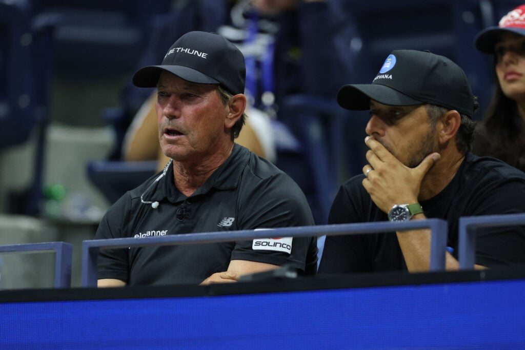 Brad Stine (L), coach of USA's Tommy Paul, attends his men's singles second round tennis match against Portugal's Nuno Borges on day five of the US Open tennis tournament at the USTA Billie Jean King National Tennis Center in New York City, on August 28, 2025.