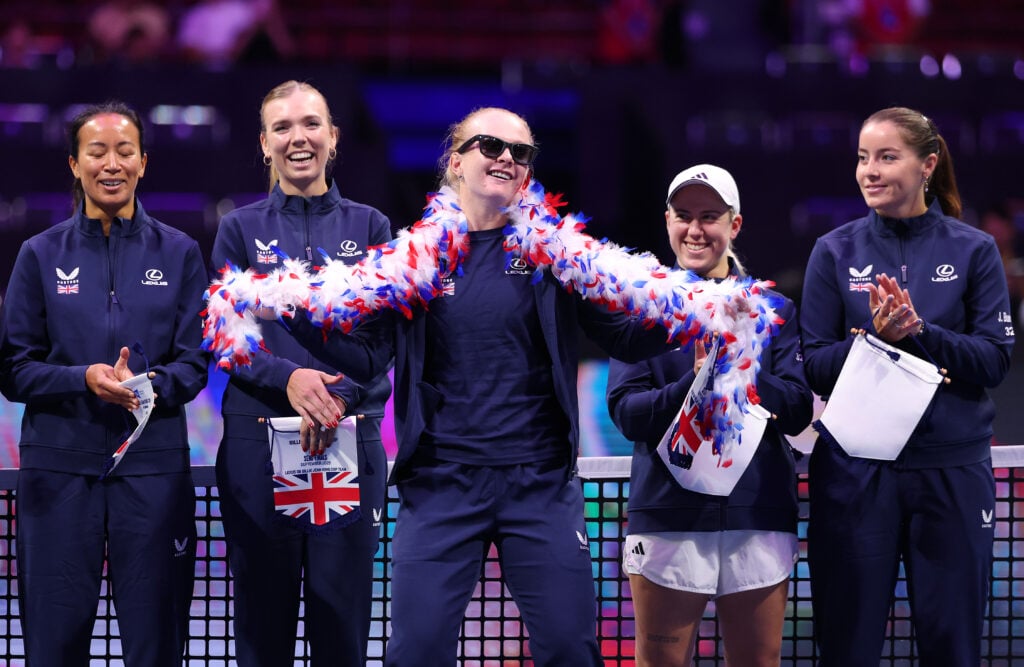 Francesca Jones (C) of Great Britain dances whilst being introduced alongside her team Anne Keothavong (L), captain of Great Britain and Katie Boulter (2L), Sonay Kartal (2R) and Jodie Anna Burrage (R) during the opening ceremony prior to match 1 in the Billie Jean King Cup by Gainbridge Finals 2025, Semi-Final match between USA and Great Britain
