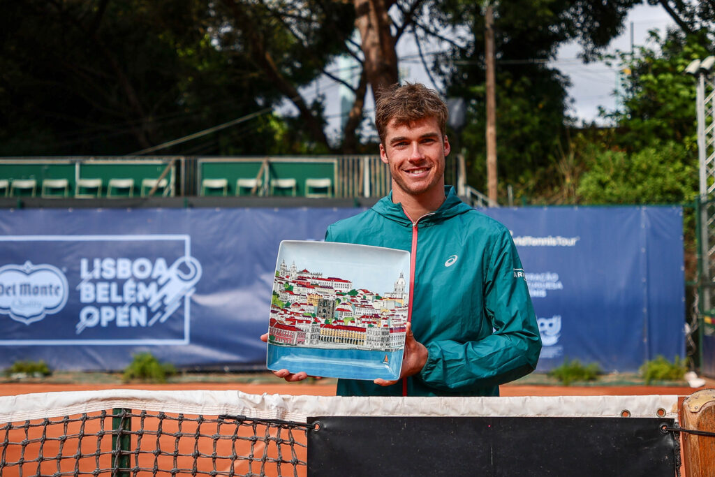 Vilius Gaubas of Lithuania with the Trophy after playing against Henrique Rocha of Portugal (not shown) during the final match of the Lisboa Belém Open 2025