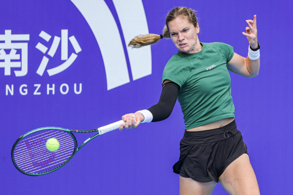 USA´s Caty McNally hits a return to New Zealand´s Lulu Sun during their women's singles quarterfinal match at the Guangzhou Open tennis tournament in Guangzhou China's southern Guangdong province on October 24, 2025.