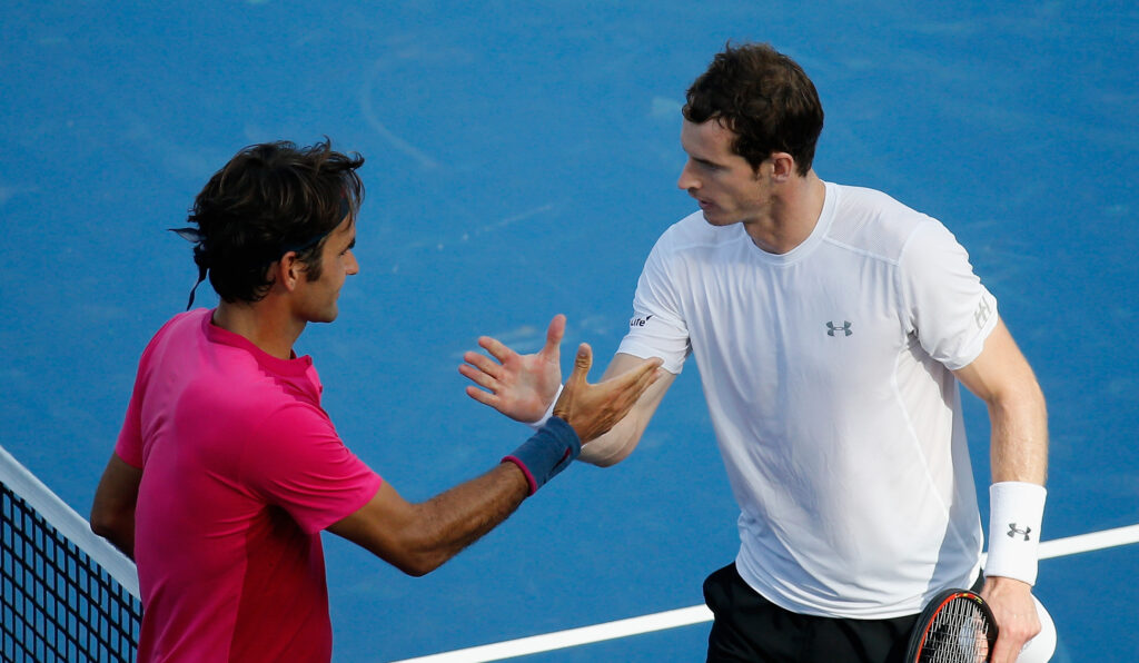 Roger Federer of Switzerland (L) shakes hands with Andy Murray of Great Britain after winning during the semifinals of the Western & Southern Open at the Linder Family Tennis Center on August 22, 2015 in Cincinnati, Ohio.