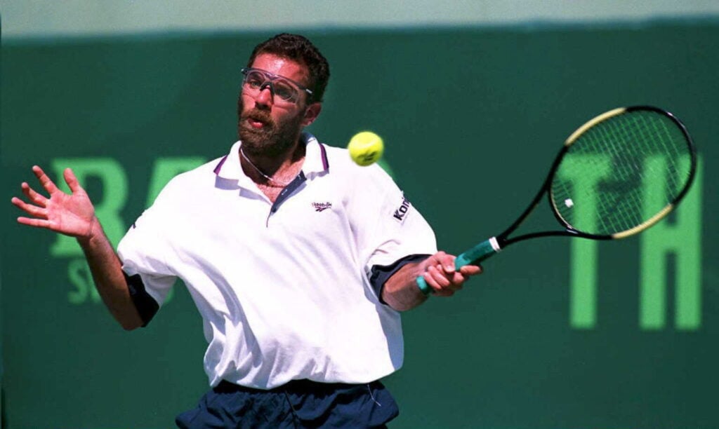 Karsten Braasch of Germany returns volley to Stephan Edberg of Sweden 18 March during play of his mens second round play in The Lipton Championships in Key Biscayne,Fl. Braasch beat the number eleven-seeded Edburg in a tie break 6-3,7-6 (7-1).