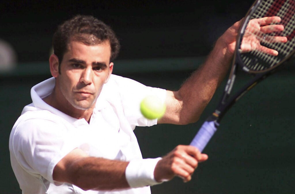 Pete Sampras hits a shot Wimbledon 2002.