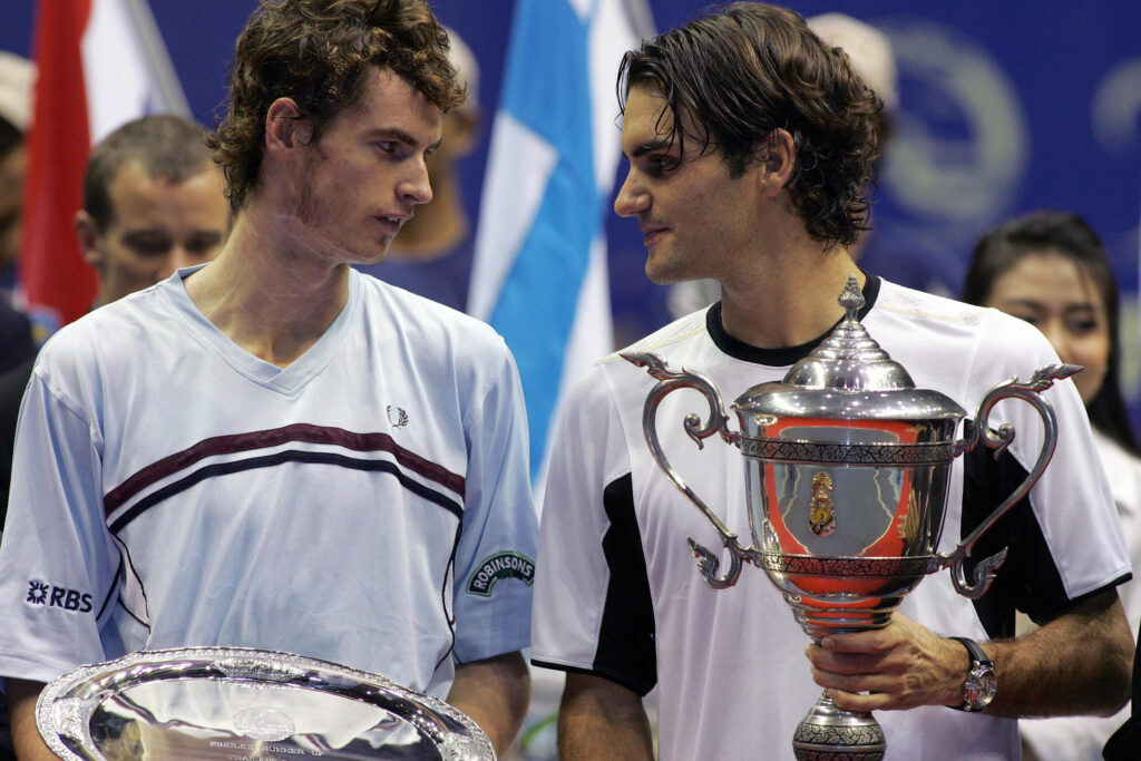 Swiss tennis player Roger Federer (R) ho